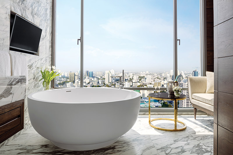 The Sukhothai Suite's modern-style, circular bathtub
